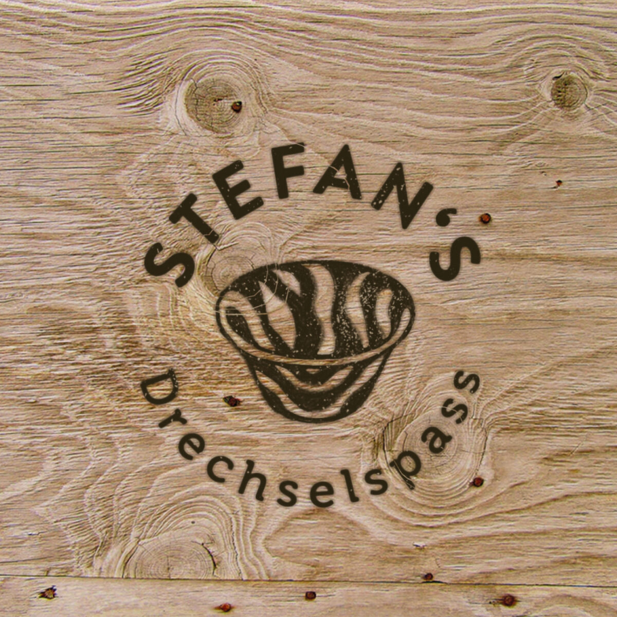 Stephans Drechselspaß Logo auf Holz